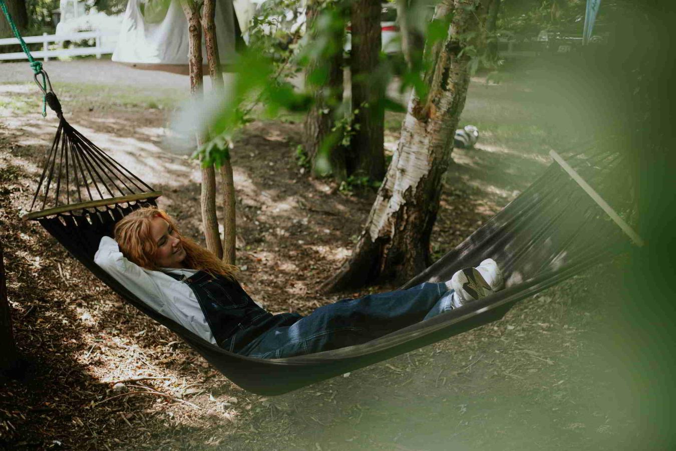 Woman smiling in hammock