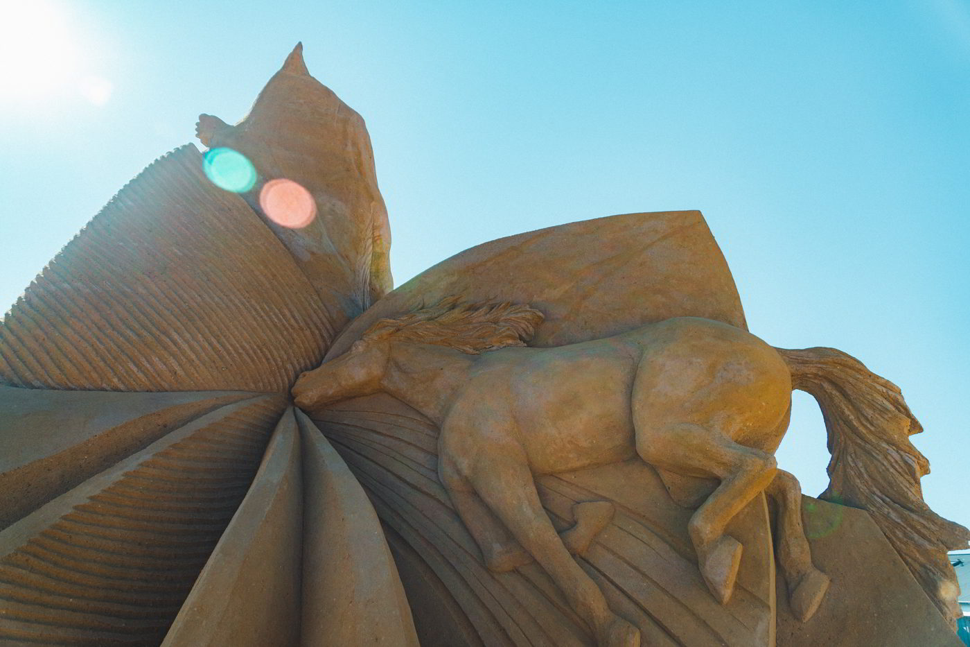 A horse floats away in this sand sculpture in Hundested Sand Sculpture Park.