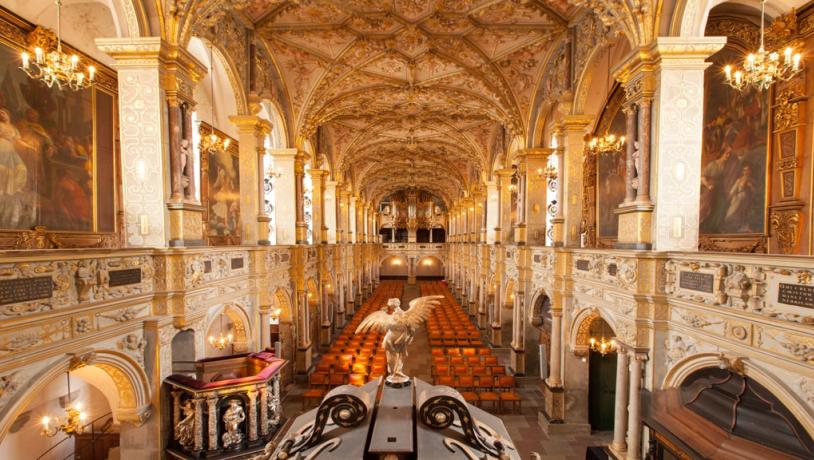 The Castle Church at Frederiksborg Castle lit in warm colors