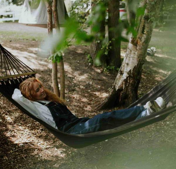 Woman smiling in hammock